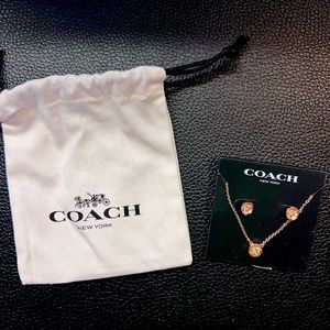 Coach necklace and earring set.